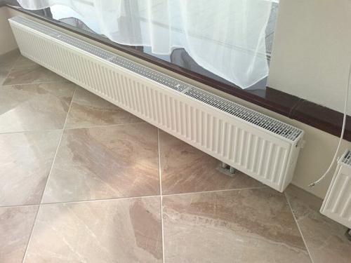 Purmo Ventil Compact CV33 200x1600 стальной панельный радиатор с нижним подключением